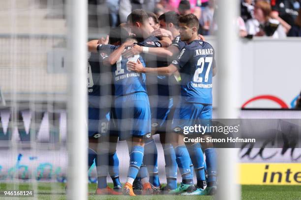 Serge Gnabry of Hoffenheim is celebrated by his team after he scored a goal to make it 1:0 during the Bundesliga match between TSG 1899 Hoffenheim...