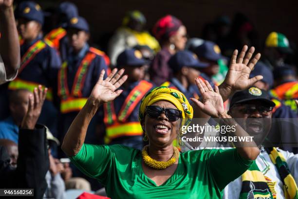 Woman in African National Congress attire react during the funeral of anti-apartheid icon Winnie Madikizela-Mandela at the Orlando Stadium, in Soweto...