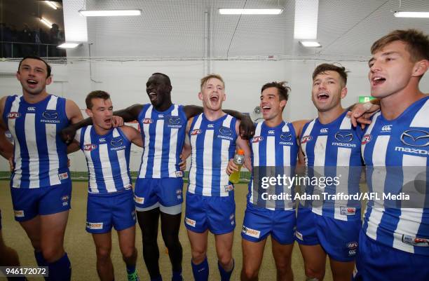 Kangaroos players sing the team song during the 2018 AFL Round 04 match between the North Melbourne Kangaroos and the Carlton Blues at Blundstone...