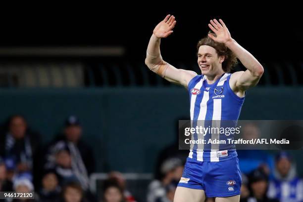 Ben Brown of the Kangaroos celebrates a goal during the 2018 AFL Round 04 match between the North Melbourne Kangaroos and the Carlton Blues at...