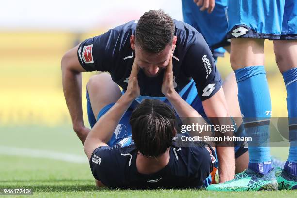 Adam Szalai of Hoffenheim celebrates with Nico Schulz of Hoffenheim after he scored a goal to make it 2:0 during the Bundesliga match between TSG...