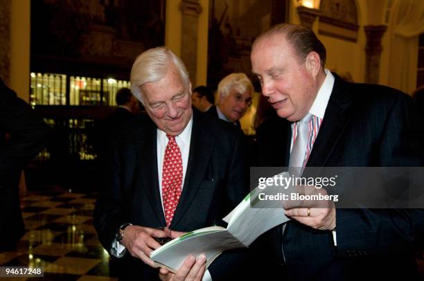 John Whitehead, left, former co-chairman, Goldman Sachs, speaks to Lee Kjelleren, president and chief executive officer of the Museum of American...