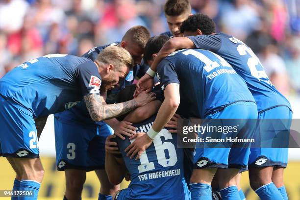 Adam Szalai of Hoffenheim celebrates with Nico Schulz of Hoffenheim and his team after he scored a goal to make it 2:0 during the Bundesliga match...