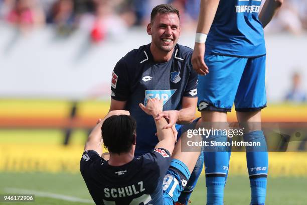 Adam Szalai of Hoffenheim celebrates with Nico Schulz of Hoffenheim after he scored a goal to make it 2:0 during the Bundesliga match between TSG...