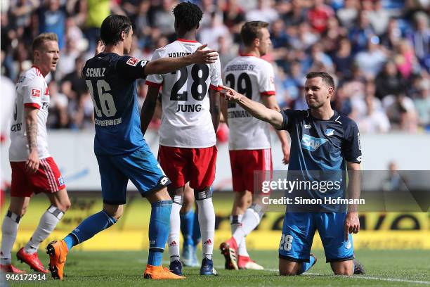 Adam Szalai of Hoffenheim celebrates with Nico Schulz of Hoffenheim after he scored a goal to make it 2:0 during the Bundesliga match between TSG...