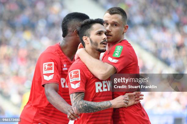 Leonardo Bittencourt of Koeln celebrates with team mates after he scored a goal to make it 0:1 during the Bundesliga match between Hertha BSC and 1....
