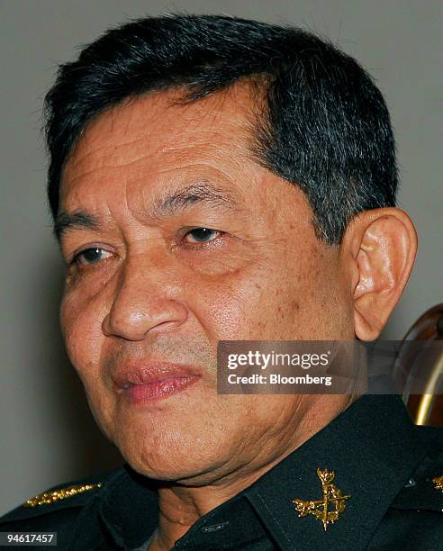 General Sondhi Boonyarataklin, leader of the Royal Thai Army and leader of the coup that ousted former Thai Prime Minister Thaksin Shinawatra, pauses...