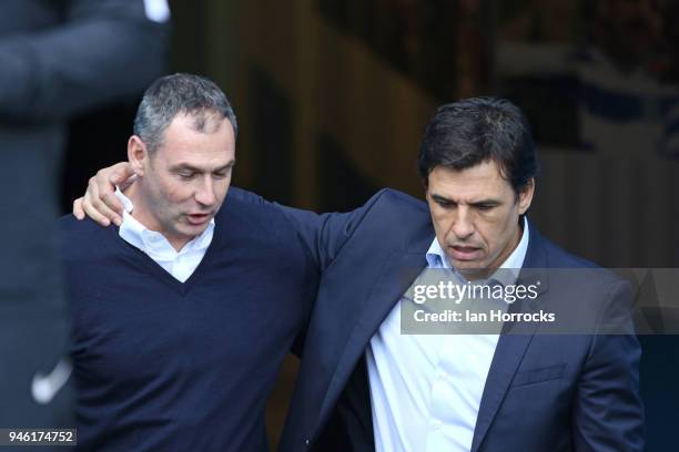 Sunderland manager Chris Coleman chats to Reading manager Paul Clement during the Sky Bet Championship match between Reading and Sunderland at...