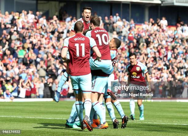 Kevin Long of Burnley celebrates with teammates after scoring his sides second goal during the Premier League match between Burnley and Leicester...