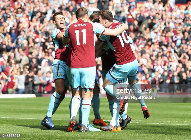 Kevin Long of Burnley celebrates with teammates after scoring his sides second goal during the Premier League match between Burnley and Leicester...