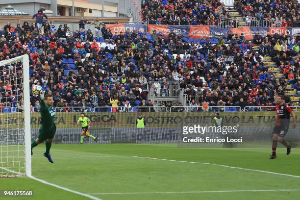 The crowd watches as Leonardo Pavoletti of Cagliaria scores during the serie A match betweenCagliari Calcio v Udinese Calcio at Stadio Sant'Elia on...