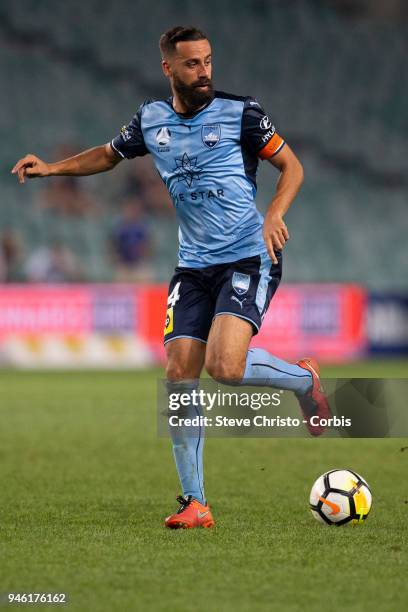 Alex Brosque of Sydney FC back heals the ball during the round 27 A-League match between the Sydney FC and the Melbourne Victory at Allianz Stadium...