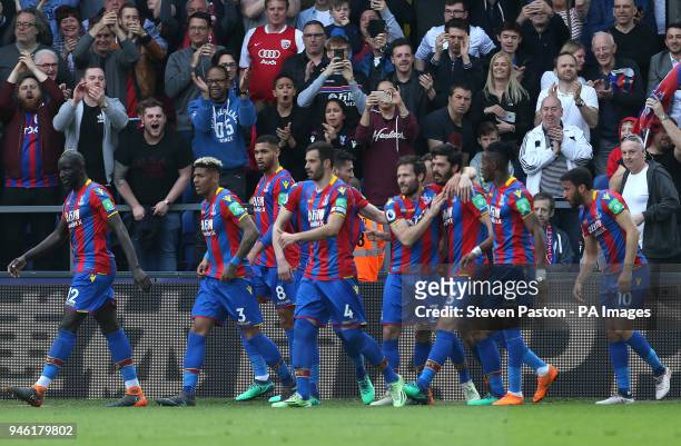 Crystal Palace's James Tomkins celebrates scoring his side's second goal of the game with team mates during the Premier League match at Selhurst...