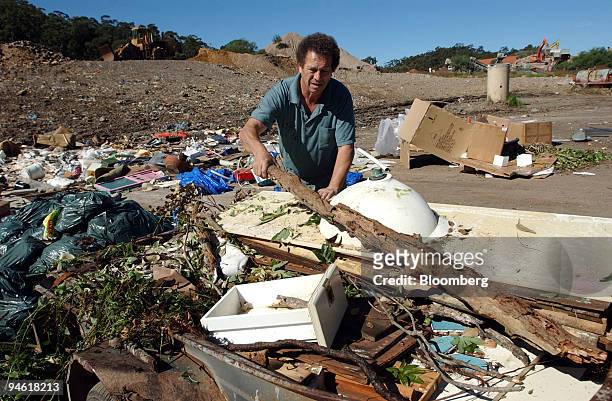 Man unloads garbage from his trailer into the Kimbriki landfill site in Sydney, Australia, on Wednesday, May 2, 2007.
