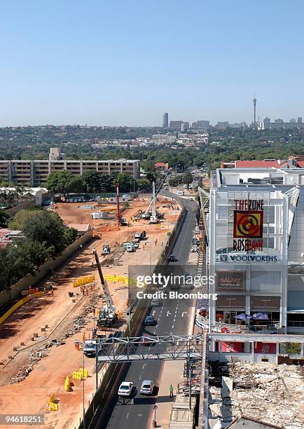 Vehicles and workers prepare to excavate ground for the construction of the Gautrain underground railway, in Rosebank, Johannesburg, South Africa,...