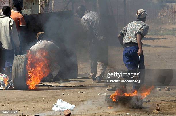 Residents battle with police in a protest against poor service delivery in the informal settlement of Zone 1, Protea Glen, Johannesburg, South Africa...
