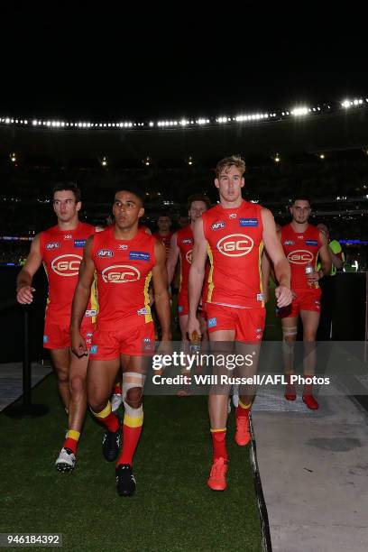 Tom Lynch of the Suns leaves the field after the teams defeat during the round four AFL match between the West Coast Eagles and the Gold Coast Suns...