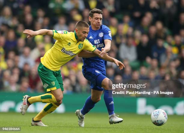 Norwich City's Moritz Leitner and Cardiff City's Craig Bryson during the Sky Bet Championship match at Carrow Road, Norwich.