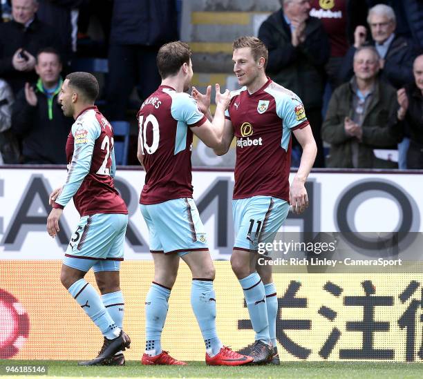 Burnley's Ashley Barnes celebrates Chris Wood's opening goal during the Premier League match between Burnley and Leicester City at Turf Moor on April...