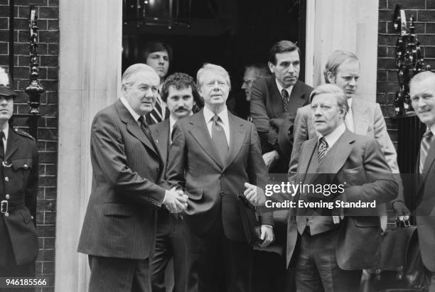 British Prime Minister James Callaghan with American President Jimmy Carter and West German Chancellor Helmut Schmidt on the steps of 10 Downing...