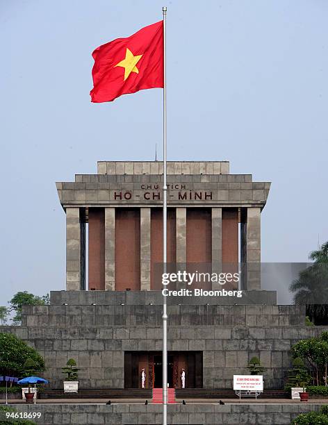 Flag billows in the wind infront of the Ho Chi Minh Mausoleum Complex in Hanoi, Vietnam on Tuesday, August 22, 2006.