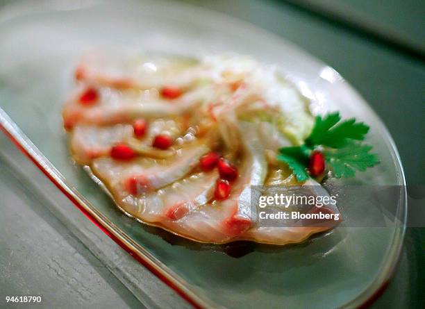 Plate of amberjack sashimi with spiced baba ganouj is arranged for a photo at Ilili, a new Lebanese restaurant located at 236 Fifth Avenue in New...