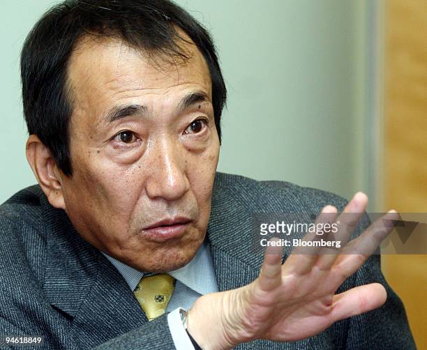 Masao Nakamura, president of NTT DoCoMo Inc., speaks to reporter during an interview at the company's headquarters in Tokyo, Japan on Wednesday,...
