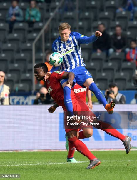 Jhon Cordoba of 1. FC Koeln and Mitchell Weiser of Hertha BSC during the Bundesliga game between Hertha BSC and 1st FC Koeln at Olympiastadion on...