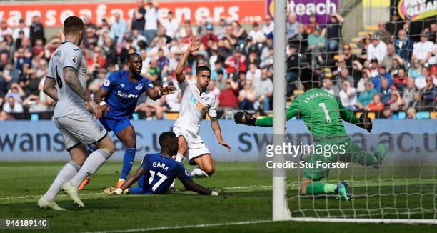 Swansea defender Kyle Naughton scores an own goal to put Everton in the lead during the Premier League match between Swansea City and Everton at...