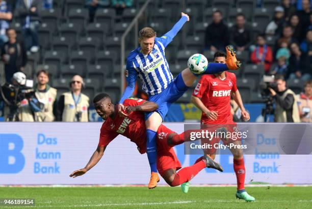 Jhon Cordoba of 1. FC Koeln and Mitchell Weiser of Hertha BSC during the Bundesliga game between Hertha BSC and 1st FC Koeln at Olympiastadion on...