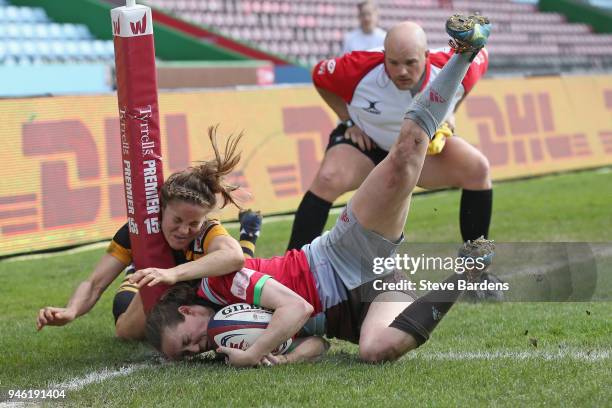Jess Wooden of Harlequins Ladies scores a try as she is tackled by Tova Derk of Wasps FC Ladies during the Tyrrells Premier 15s Semi Final 2nd Leg...
