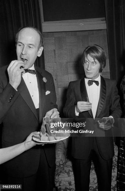 French minister Valery Giscard d'Estaing with french actor and singer Jacques Dutronc in Paris for a Gala of film "Fleur de Cactus", 18th december...