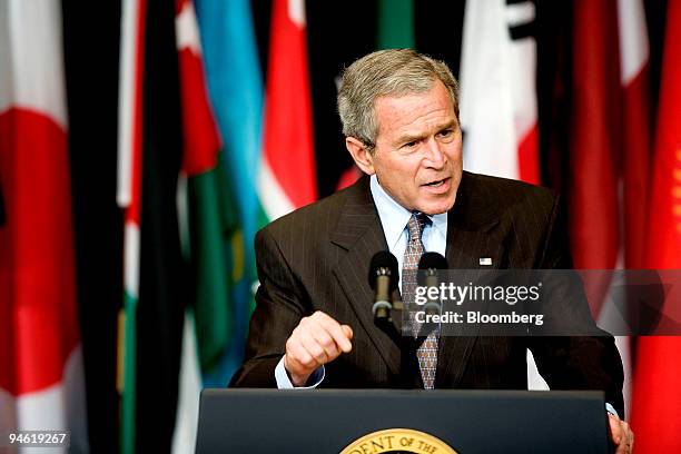 President George W. Bush, left, addresses the CENTCOM Coalition conference at MacDill Air Force Base in Tampa, Florida, May 1, 2007. Bush addressing...