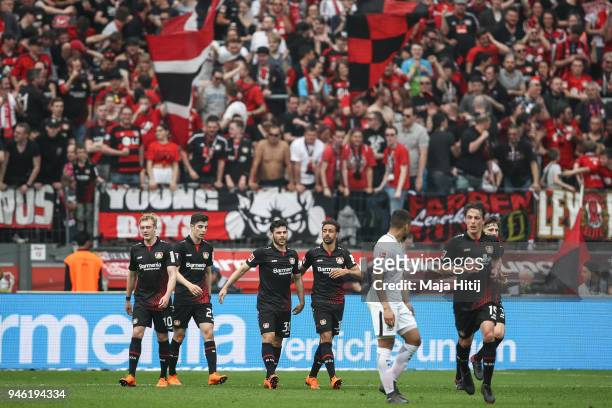 Kevin Volland of Bayer Leverkusen celebrates with his team-mates after scoring his teams thirth goal to make it 3-1 during the Bundesliga match...