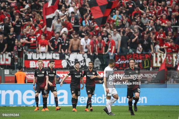 Kevin Volland of Bayer Leverkusen celebrates with his team-mates after scoring his teams thirth goal to make it 3-1 during the Bundesliga match...