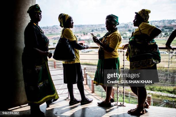 Mourners dressed in the colours of the ruling African National Congress , attend the funeral of anti-Apartheid champion Winnie Madikizela- Mandela at...