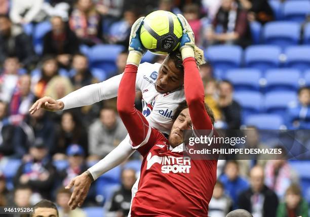 Amiens' French goalkeeper Regis Gurtner vies with Lyon's Spanish forward Mariano Diaz during the French L1 football match between Lyon and Amiens on...