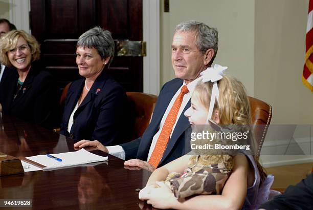 President George W. Bush meets with representatives of America Supports You, an organization that supports the United States military in Iraq and...