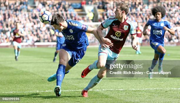 Leicester City's Harry Maguire clears under pressure from Burnley's Ashley Barnes during the Premier League match between Burnley and Leicester City...