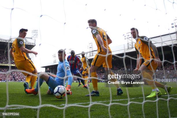 Mathew Ryan of Brighton and Hove Albion looks back as the ball crosses the line for Crystal Palace's second goal, scored by James Tomkins of Crystal...