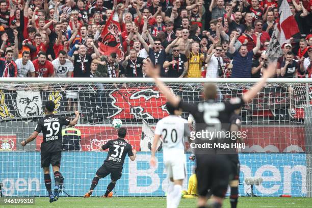 Kevin Volland of Bayer Leverkusen scores his teams forth goal to make it 4-1 during the Bundesliga match between Bayer 04 Leverkusen and Eintracht...