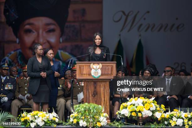 British supermodel Naomi Campbell speaks during the funeral of anti-apartheid icon Winnie Madikizela-Mandela, at the Orlando Stadium in the township...