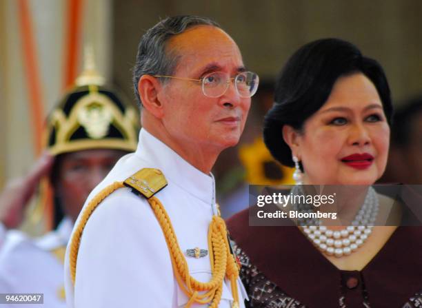 Bhumibol Adulyadej, king of Thailand, and his wife Sirikit watch the inauguration of a Royal Thai Navy costal patrol boat at the Navy boatyard in...