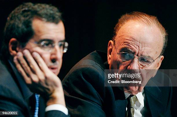 Rupert Murdoch, chairman and chief executive officer of News Corp., right, listens as Peter Chernin, president and chief operating officer of News...