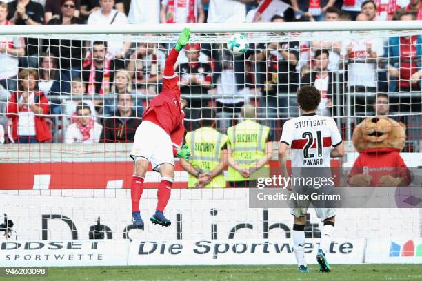 Goalkeeper Ron-Robert Zieler of Stuttgart lets in a header from Niclas Fuellkrug of Hannover during the Bundesliga match between VfB Stuttgart and...