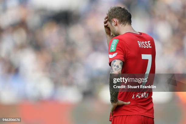 Marcel Risse of Koeln looks dejected after the Bundesliga match between Hertha BSC and 1. FC Koeln at Olympiastadion on April 14, 2018 in Berlin,...
