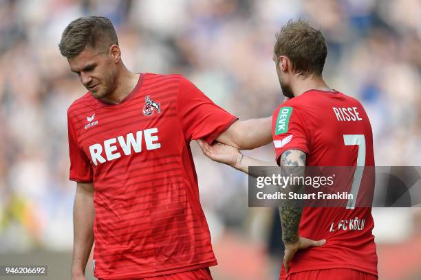 Simon Terodde of Koeln and Marcel Risse of Koeln look dejected after the Bundesliga match between Hertha BSC and 1. FC Koeln at Olympiastadion on...