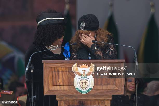 Zenani Mandela-Dlamini and Zindzi Mandela , daughters of the late anti-apartheid icon Winnie Madikizela-Mandela, react as they give their speech...
