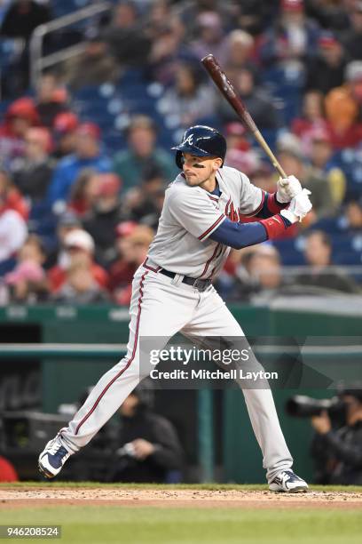 Ryan Flaherty of the Atlanta Braves prepares for a pitch during a baseball game against the Colorado Rockies at Nationals Park on April 10, 2018 in...