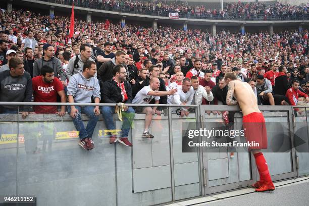 Supporters of Koelen show their feelings about their team while Marcel Risse of Koeln talks to them, after the Bundesliga match between Hertha BSC...